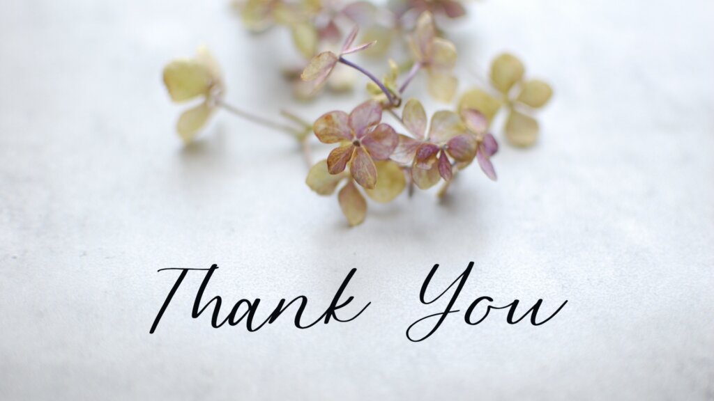 シンプルな花と「THANK YOU」の文字